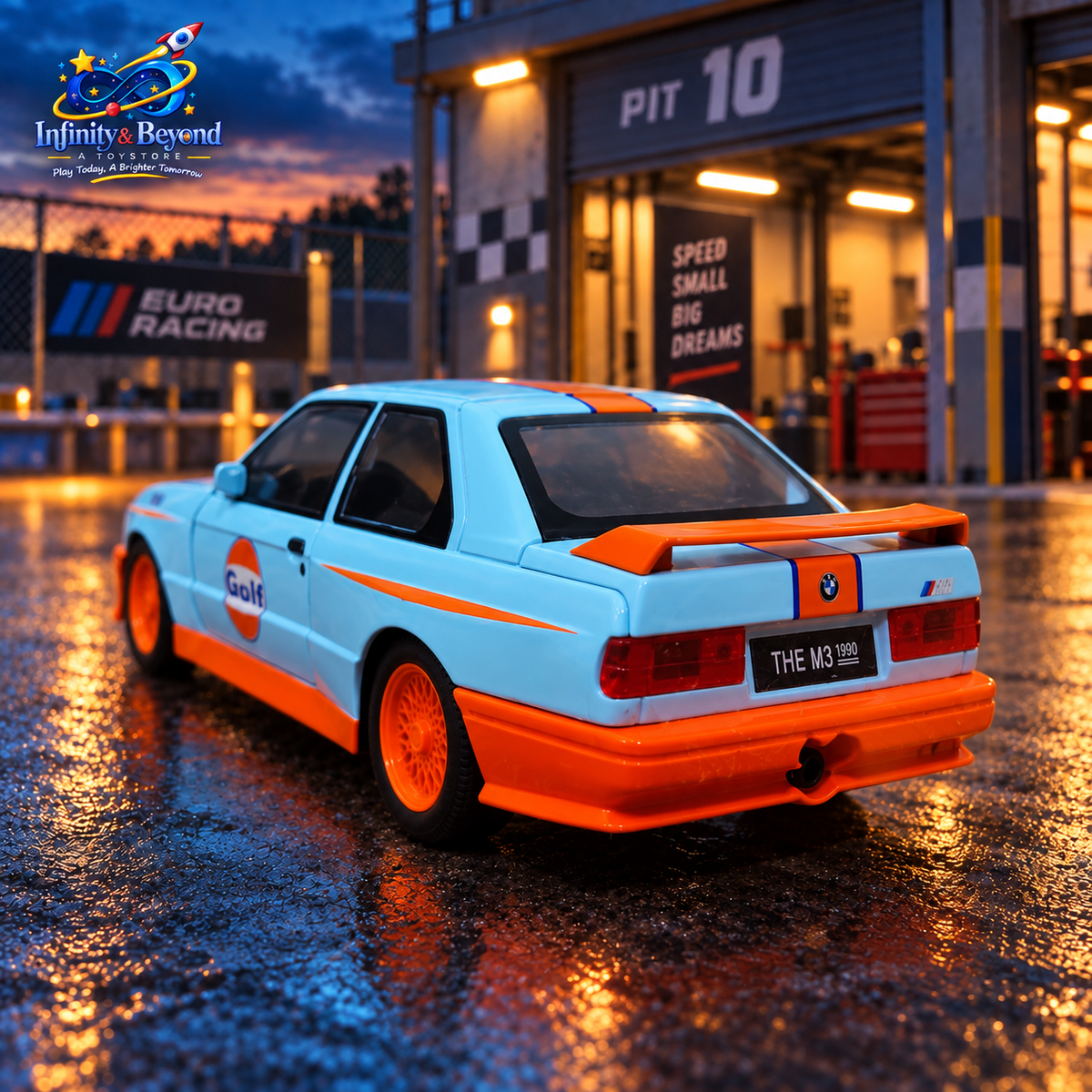 Rear three-quarter view of light blue and orange BMW M3 RC model with orange spoiler